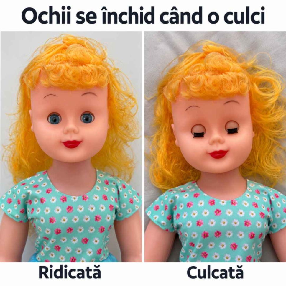 Păpușa cu ochii deschiși când este ridicată și cu ochii închiși când este culcată