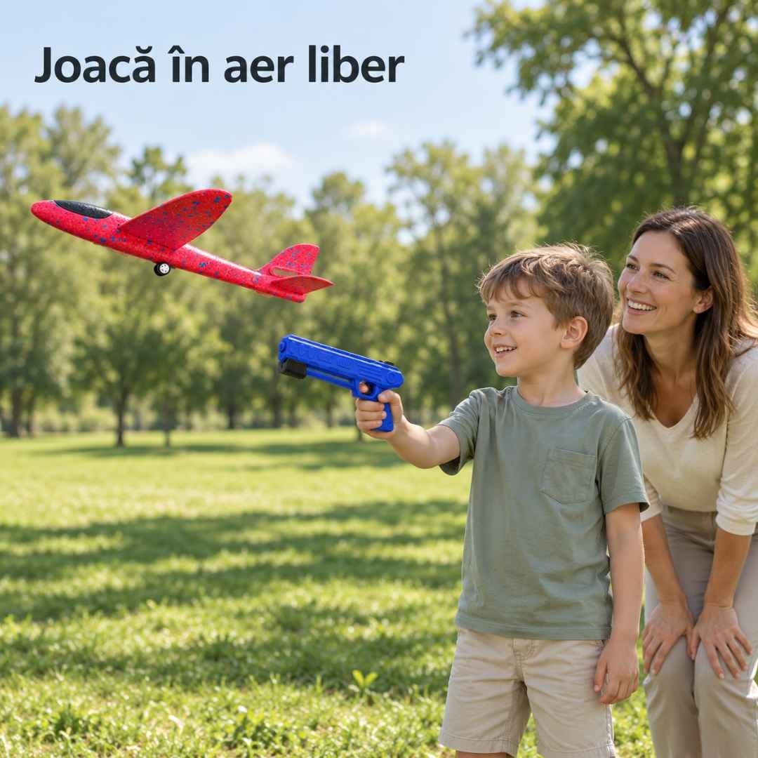 Copil și părinte se joacă împreună în parc cu avionul din spumă și lansatorul