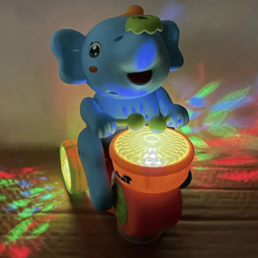 Elefant Toboșar Interactiv cu Lumini, Sunete și Minge (culoare aleatorie)