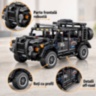Set de construcție SUV off-road din 909 piese