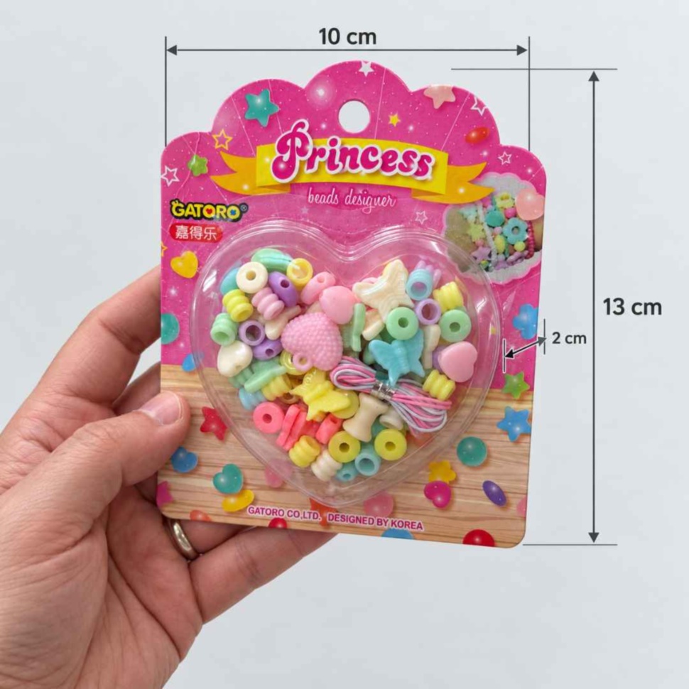 Ambalaj Princess ținut în mână, cu dimensiuni de 13 cm înălțime, 10 cm lățime și 2 cm grosime