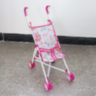 Cărucior de Jucărie pentru Păpuși cu Cadru Metalic și Design Floral Roz