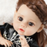 Păpușă Reborn Interactivă cu Corp Moale și Rochie Elegantă – 35 cm