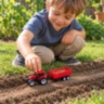 Tractor de jucărie cu remorcă și mecanism pull-back