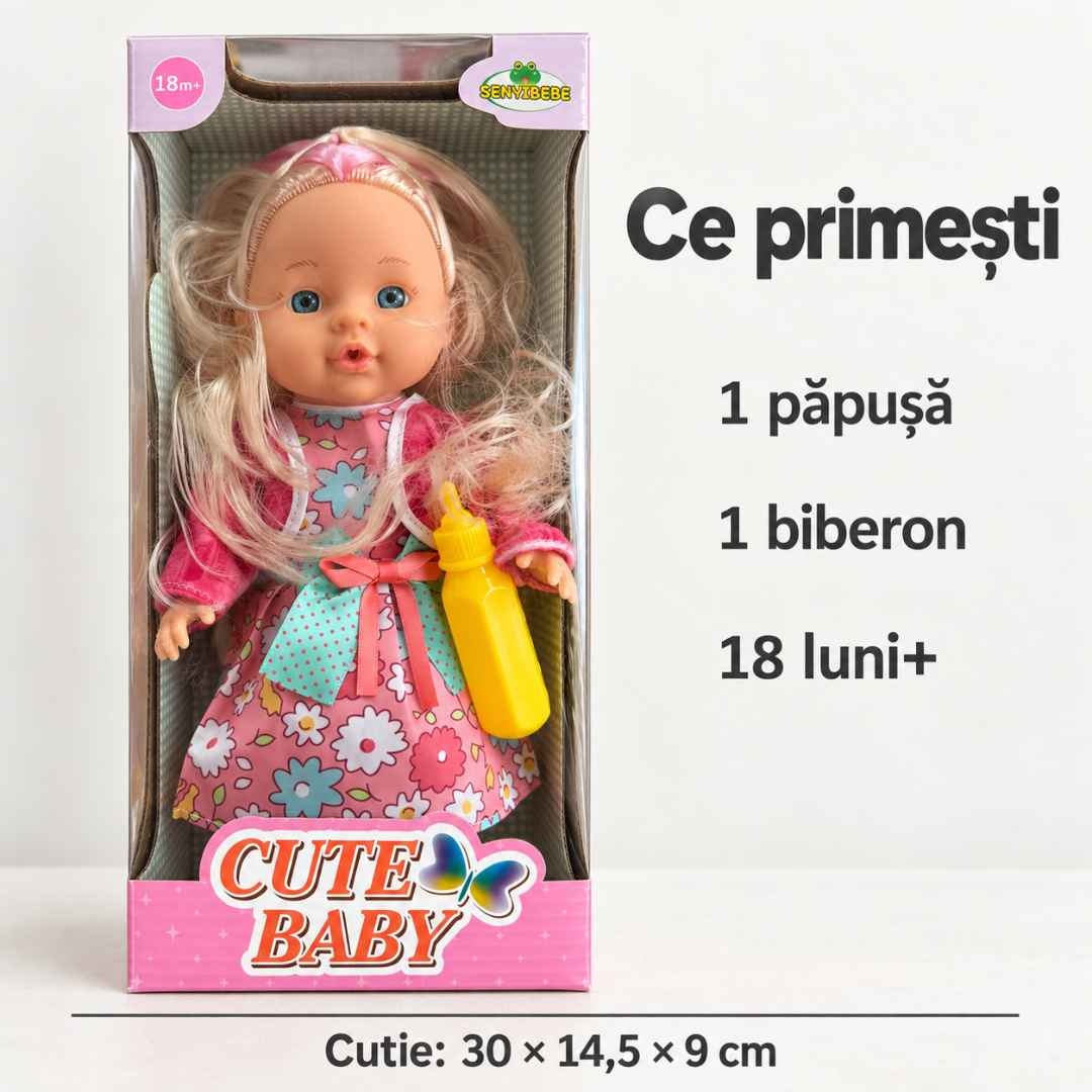 Ambalajul păpușii, cu o păpușă și un biberon incluse, marcaj 18 luni+ și dimensiuni ale cutiei de 30 × 14,5 × 9 cm