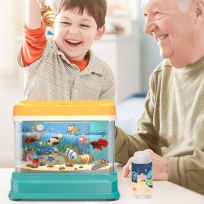 Acvariu de jucărie cu pești magnetici, lumină și muzică | image