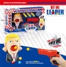 Pistolul "Lichidează Liderul" cu Bile, 3 Proiectile și Trump in rol de Țintă